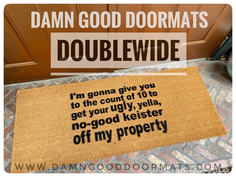 double wide coir doormat with quote from Home Alone reading get your no good keister off my property on brick patio with copper doorms